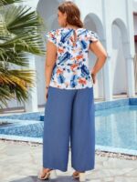 Conjunto Feminino Plus Size Lara, blusa com manga esvoaçante e calças ajustadas, estampa floral vibrante. Confortável e estiloso para um visual boho.