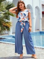 Conjunto Feminino Plus Size Lara, blusa com manga esvoaçante e calças ajustadas, estampa floral vibrante. Confortável e estiloso para um visual boho.