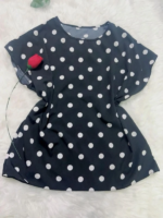 Blusa Plus Size Rebeca com estampa de poá, mangas morcego, gola redonda. Clássica e confortável, perfeita para looks casuais e elegantes.