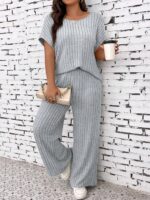 Conjunto Feminino Plus Size Giulia, blusa com manga morcego e calças ajustadas, em roxo, confortável e estiloso para qualquer ocasião.