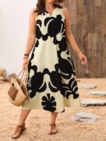 Vestido Plus Size Rafaella, estilo túnica, com decote V, estampa gráfica amarela, ajuste regular, ideal para ocasiões casuais e dias de sol.