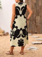 Vestido Plus Size Rafaella, estilo túnica, com decote V, estampa gráfica amarela, ajuste regular, ideal para ocasiões casuais e dias de sol.