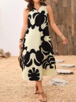 Vestido Plus Size Rafaella, estilo túnica, com decote V, estampa gráfica amarela, ajuste regular, ideal para ocasiões casuais e dias de sol.