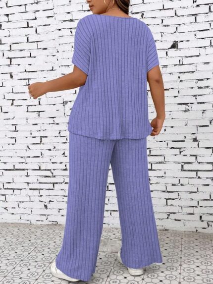 Conjunto Feminino Plus Size Giulia, blusa com manga morcego e calças ajustadas, em roxo, confortável e estiloso para qualquer ocasião.