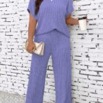 Conjunto Feminino Plus Size Giulia, blusa com manga morcego e calças ajustadas, em roxo, confortável e estiloso para qualquer ocasião.