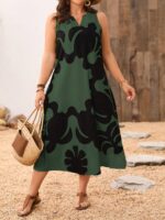 Vestido Plus Size Rafaella, estilo túnica, com decote V, estampa gráfica amarela, ajuste regular, ideal para ocasiões casuais e dias de sol.