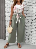 Conjunto Feminino Plus Size Lara, blusa com manga esvoaçante e calças ajustadas, estampa floral vibrante. Confortável e estiloso para um visual boho.