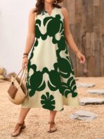 Vestido Plus Size Rafaella, estilo túnica, com decote V, estampa gráfica amarela, ajuste regular, ideal para ocasiões casuais e dias de sol.