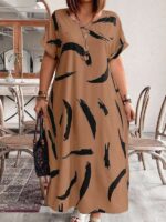 Vestido Plus Size Bruna Casual, estampa em blocos de cores, decote V, mangas morcego. Confortável e estiloso para diversas ocasiões.