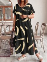 Vestido Plus Size Bruna Casual, estampa em blocos de cores, decote V, mangas morcego. Confortável e estiloso para diversas ocasiões.