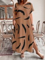 Vestido Plus Size Bruna Casual, estampa em blocos de cores, decote V, mangas morcego. Confortável e estiloso para diversas ocasiões.