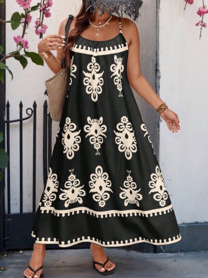 Vestido Bohemian Longo, estilo Boho, com estampa floral e tribal, alças finas e bainha flared. Confortável, ideal para dias ensolarados.