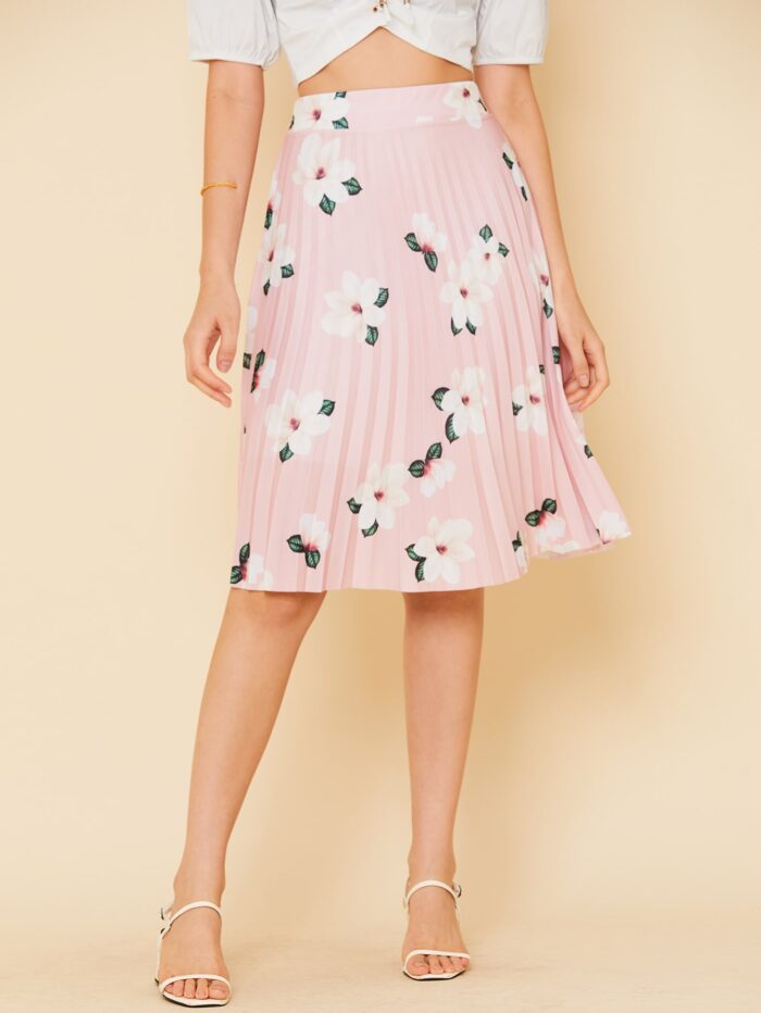 Saia midi evangélica plissada com estampa floral, cintura alta e tecido leve. Ideal para um visual casual e elegante em diferentes ocasiões.