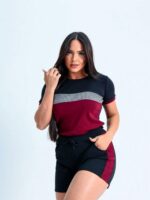 Conjunto Ester com blusa e short de esporte, feito de poliéster e elastano, com alta elasticidade e caimento regular. Leve, respirável, ideal para climas quentes.