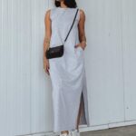 Vestido longo Patricia, sem mangas e com caimento justo. Feito de tecido flexível, proporciona elegância e conforto para ocasiões modernas.