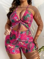 Maiô Plus Size com estampa tropical em pink, recorte vazado, amarração frontal e decote profundo. Ideal para praia e piscina, com ajuste perfeito.