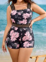 Maiô plus size com estampa floral multicolorida, alças grossas e malha de contraste, ideal para praia e piscina com conforto e estilo.