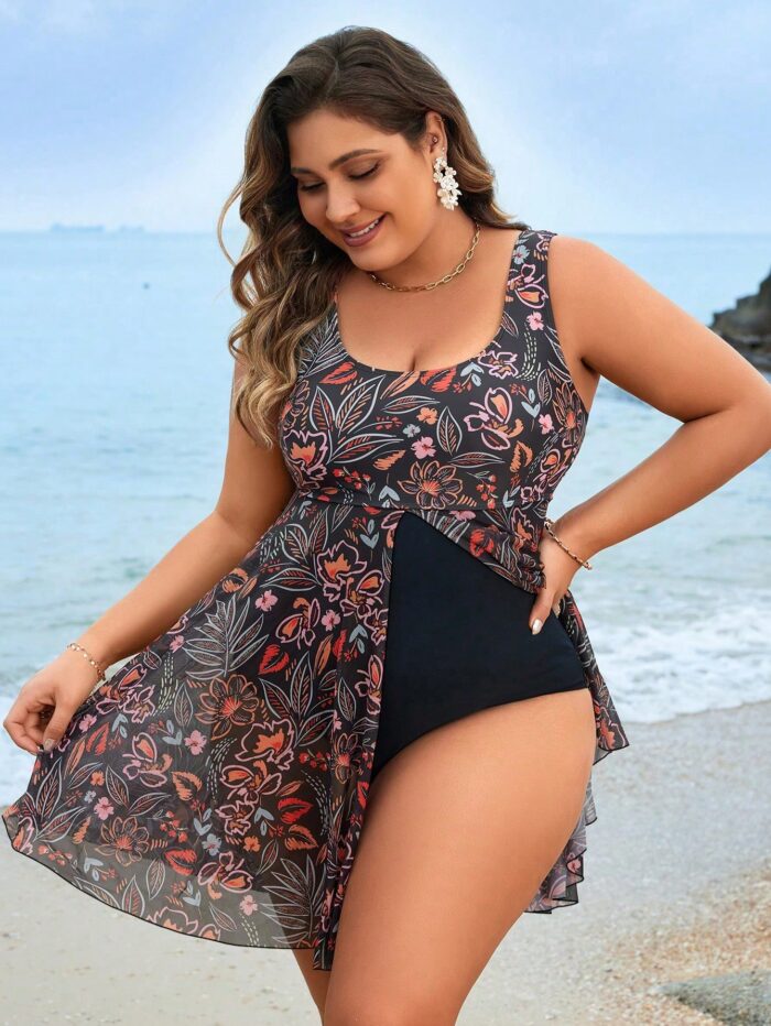 Maiô Plus Size com estampa floral vibrante, cintura alta e alças grossas. Ideal para dias de férias, combinando conforto e estilo boho.