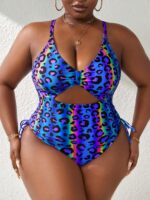 Maiô Plus Size decotado, estampa de onça e detalhe franzido. Ideal para momentos de lazer com estilo, conforto e sofisticação.